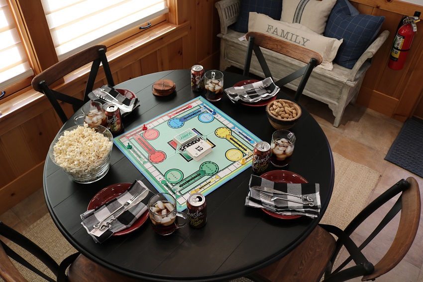 Lakeside-Living_Manitowish-Waters-WI_5-Easy-Ways-to-Liven-Up-Your-Indoor-Entertainment_Game-Night_Place-Settings_Dining-Table