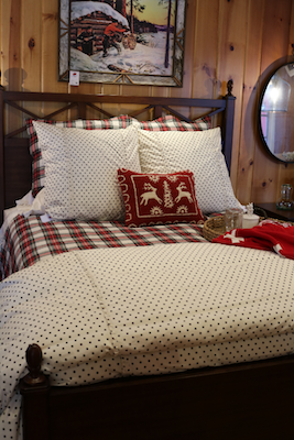 Lakeside-Living_Manitowish-Waters_Northwoods-WI_What-it-is-Really-Like-to-Work-with-an-Interior-Designer_Rustic-Cabin-Bedroom-with-Local-Throw-Pillow