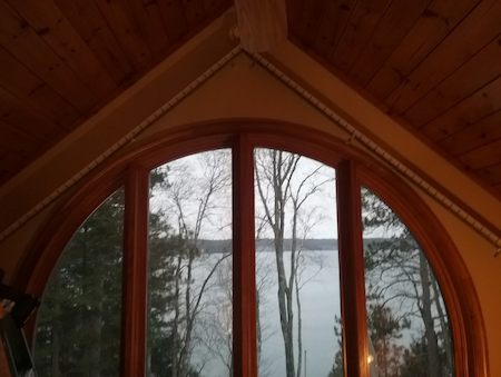 Lakeside-Living_Manitowish-Waters-Wisconsin_Northwoods-Interior-Design_Ready-to-Beautify-Your-Windows_Our-Team-is-Here-to-Help_Loft-Arched-and-Rounded-Window-with-a-View