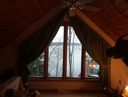 Lakeside-Living_Manitowish-Waters-Wisconsin_Northwoods-Interior-Design_Ready-to-Beautify-Your-Windows_Our-Team-is-Here-to-Help_Loft-Window-with-Open-Stationary-Draperies-with-Lake-View